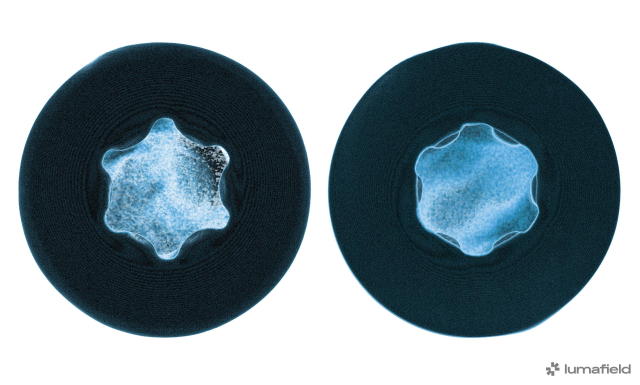 X-ray image showing a side-by-side comparison of Torx and Torx Plus screw heads. The Torx head has pointier points than the Torx Plus, which has almost flat points. Image by Lumafield.