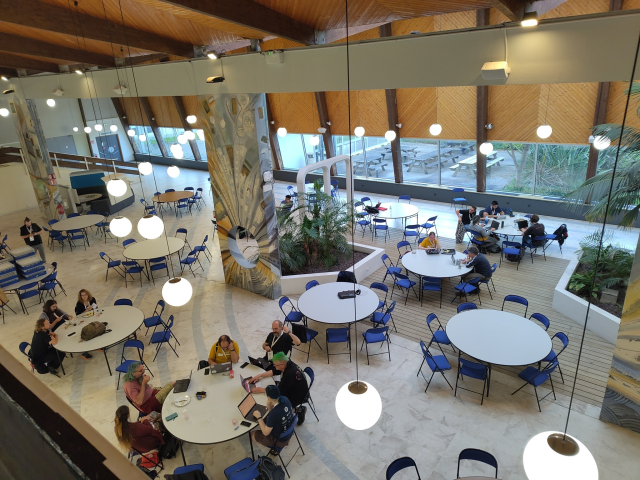 Groups of people sitting around tables at the IMT Atlantique's Centre-Vie