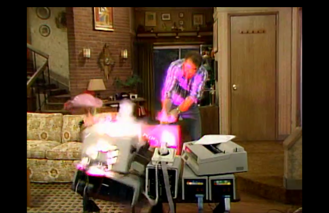 Al smashes the screen and it emits and awesome flash of purple light (probably fake, I dunno)