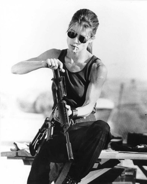 Linda Hamilton in Terminator 2, loading her gun.