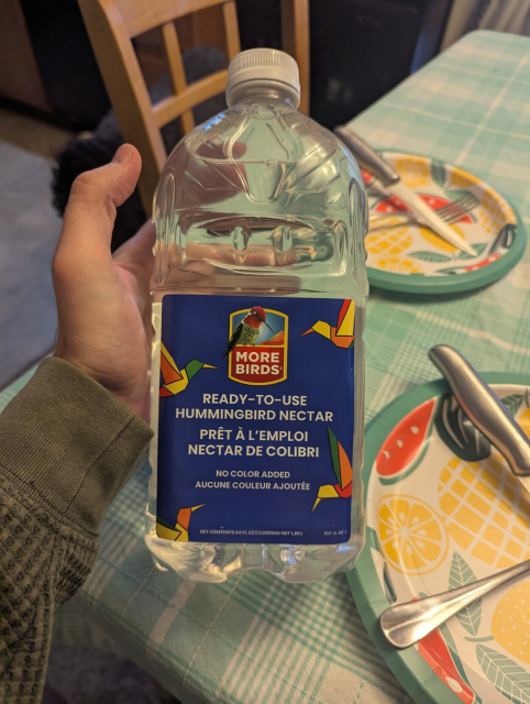 A bottle of ready-to-use hummingbird nectar.