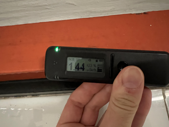 Train station Potsdamer Platz with around 30 times background at 1.44 microsievert up close to the tiles. Only a thin strip of tiles is left, the rest are modern white ones.