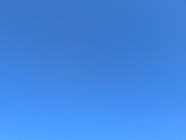 A photo of a completely blue sky.