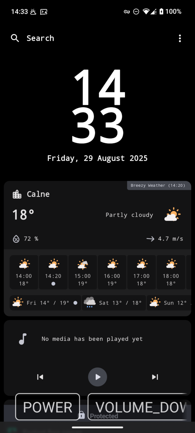 A black wallpaper with the time, date and weather being shown on a android phone