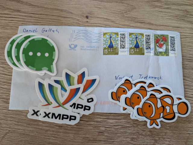 Conversations, XMPP and OMEMO stickers on an envelope.