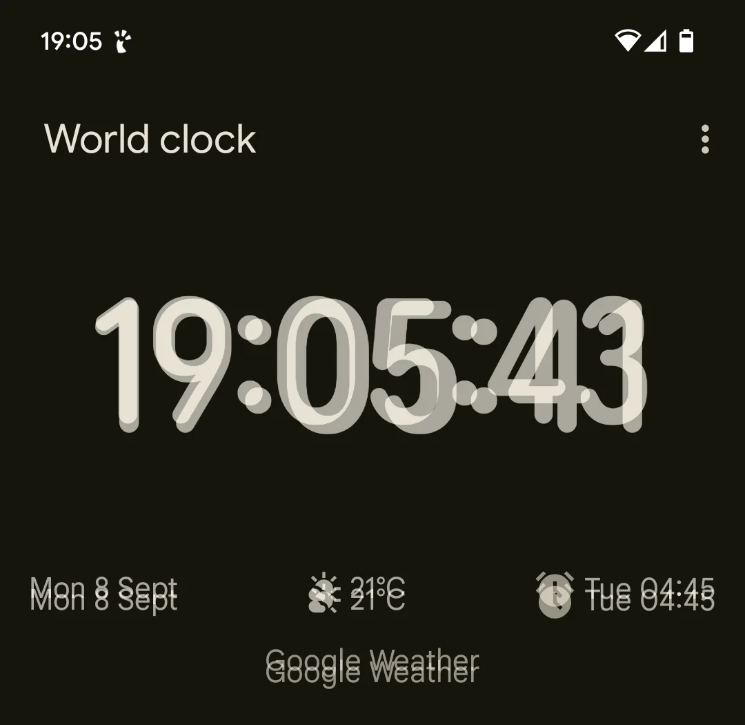 Two screnshots of said world clock, overlaid to illustrate the effect.