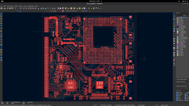 mnt reform qualcomm processor module, front layer with red traces in kicad pcb layout editor. quite busy with a bunch of bigger chips.