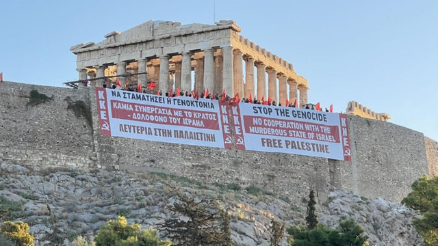 Acropolis with a banner reading:

Stop the genocide. No cooperation with the murderous state of Israel. Free Palestine.