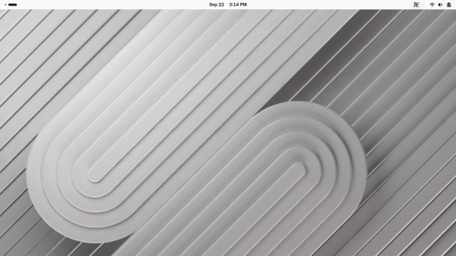 Screenshot of a minimalist GNOME desktop including a white-colored top panel. Alongside the system icons there's a Slack icon, which ends up looking like a backwards swastika.