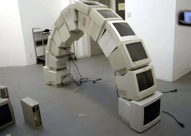 An arch made of old CRT monitors.