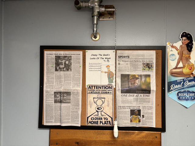 Sign above urinals:

ATTENTION players with short bats

Please stand closer to home plate