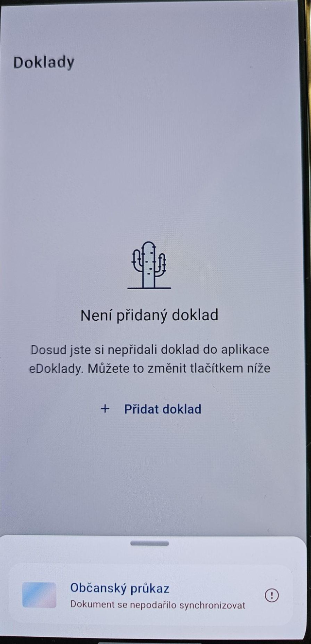 Obrazovka android aplikace eDoklady.
Není přidán doklad

dole popup s nadpisem "Občanský průkaz" a pod ním chybová zpráva "Doklad se nepodařilo synchronizovat" 