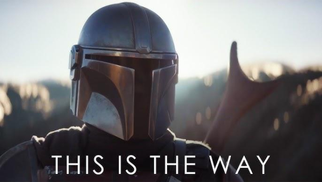 Close-up of the Mandalorian with a caption that says "This is the way"