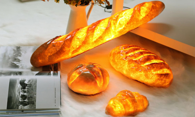 A photo of several glowing loaves of bread