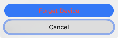 Screenshot of a macOS confirmation button with red text on blue background