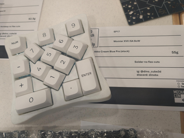a numpad that references the paper about efficiently packing 17 squares by using that as the layout.
it's cursed