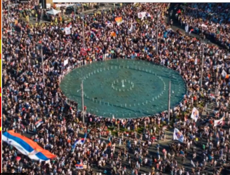 Wide angle image of a sea of people in central Belgrade
