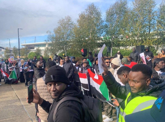 Crowds gather to protest the Sudanese genocide outside Man City.  The brother of the owner directly funds the RSF.