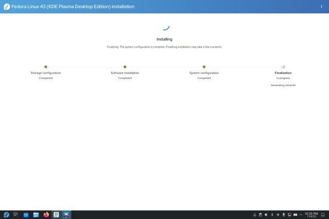 Fedora Linux 43 (KDE Plasma) installation screen showing progress: storage, software and system configuration completed; finalization in progress with "Generating initramfs" message and a progress spinner, desktop panel visible at bottom.