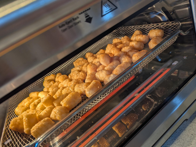 Making a tray of tater tots in said air frier