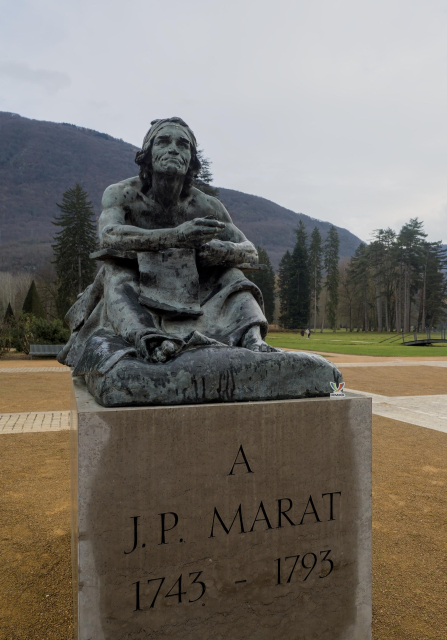 A statue of Marat in a park, with "À J.P. MARAT 1743-1793" inscribed in the stone below.
A tiny xmpp sticker can be seen on the top right corner of the stone.