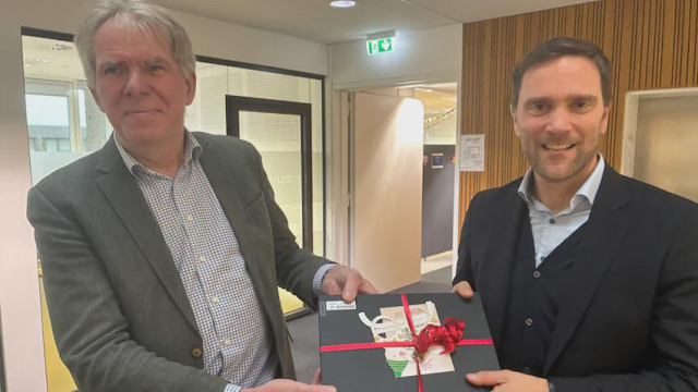 In this picture we see, Danish head of government IT (left) hands over the first "microsoft-free" computer to the head of Danish Traffic control, December 2025. Source https://www.reddit.com/r/linux/comments/1pohupu/danish_head_of_government_it_left_hands_over_the/