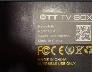 A photo of the back of an Android TV streaming box says

RAM: 4GB
Rom 32GB
Input DC5v, 2000 mA
Made in China
Overseas use only