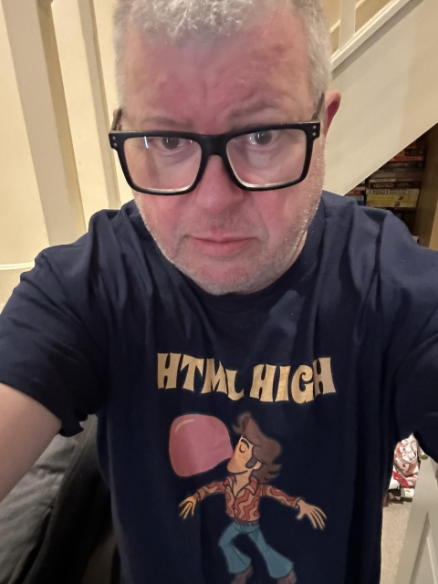 me wearing my HTML HIGH shirt