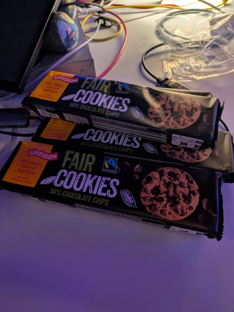 Fair trade cookies on a table between cables and lights. I paid a fortune for those...