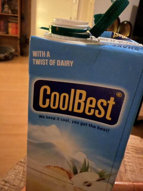 Photo of a box of Coolbest, with the text “with a twist of dairy” on one of its corners.