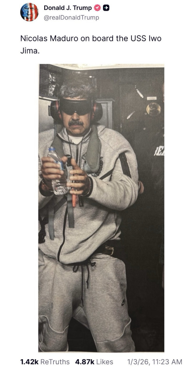 Trump posted a photo on social media showing Maduro wearing a sweatsuit and a blindfold with the caption: “Nicolas Maduro on board the USS Iwo Jima.” Maduro appeared to be wearing a flotation device around his neck. Next to him was someone wearing a jacket that had a DEA logo. Maduro also had protective headphones on his ears and appeared to be lifting a water bottle with both arms to drink