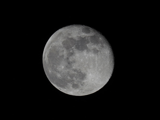 A picture of an almost full moon. Sony A7C. 1/50 f/16 600mm. Slightly cropped.