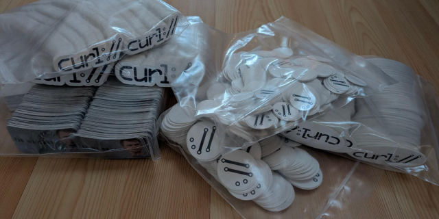 lots of curl stickers in plastic bags