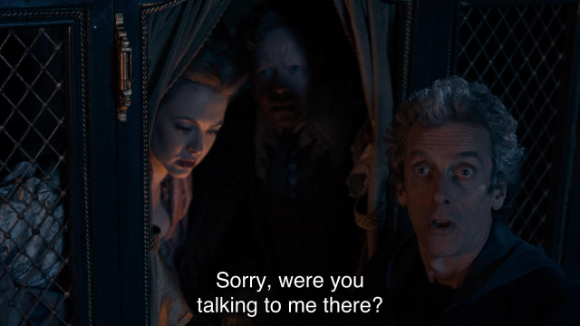 Episode with Peter Capaldi, teenage heartthrob. The Doctor is standing next to a 16th century stagecoach in the middle of night. A man and a woman are inside the carriage, looking surprised and perplexed at what’s happening around them. The Doctor is speaking to someone off-screen. Captions read, “Sorry, were you talking to me there? Try again, I’ll promise I’ll listen this time.”