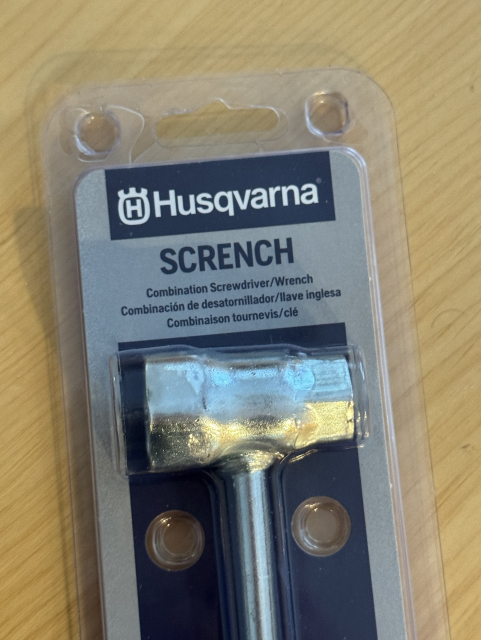 A Husqvarna branded “Scrench” - a combination screwdriver / wrench