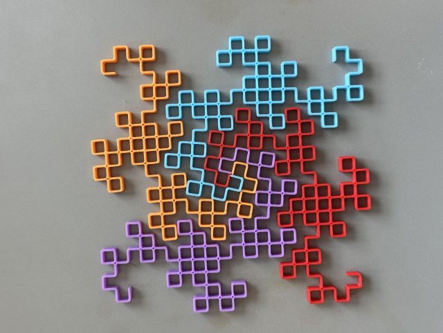 Four tiled dragon curves