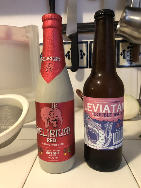 Two bottles of beer on the kitchen counter, Delirium Red (Belgium) and Tiburón Leviatán (Veracruz)