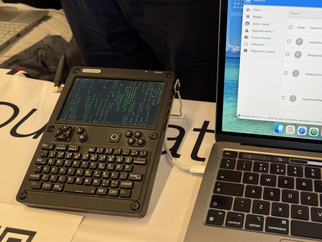 A cyberdeck with a screensaver that looks like the famous animation from Matrix the movie