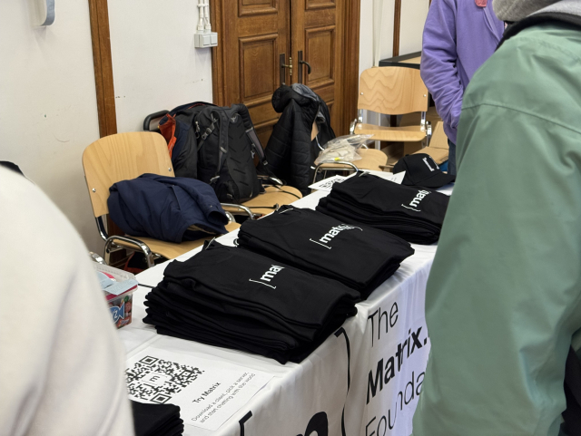 A picture of T-shirts on the booth